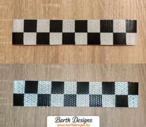 Fehér-fekete kockás fényvisszaverő szalag